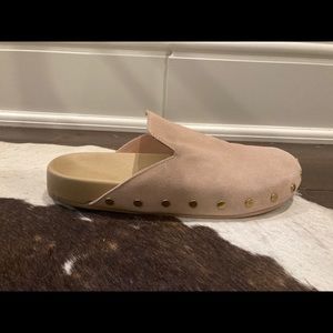 Leather mules/clogs with studded detail.